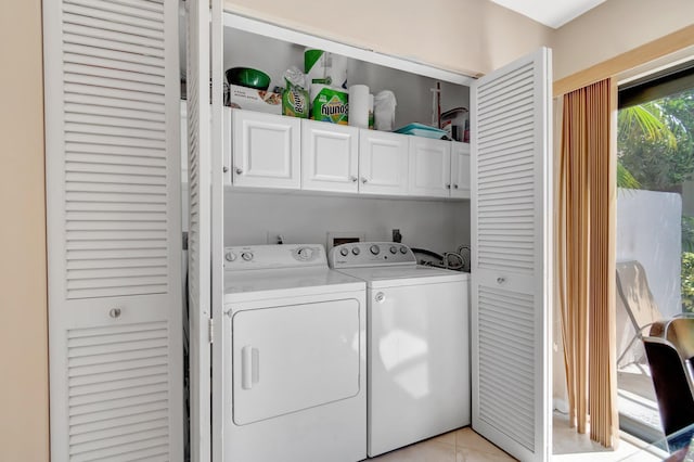 8030 Eastlake Dr Unit 10B, Boca Raton, FL 33433 - clothes washing area with cabinet space and washing machine and dryer
