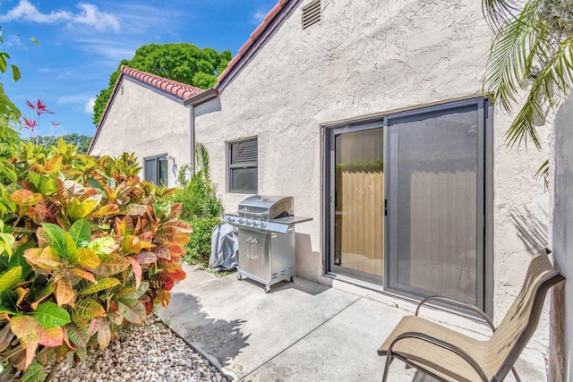 8030 Eastlake Dr Unit 10B, Boca Raton, FL 33433 - view of patio featuring grilling area