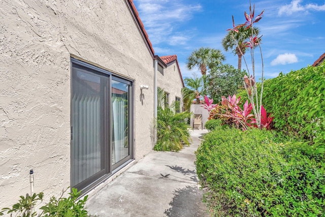 8030 Eastlake Dr Unit 10B, Boca Raton, FL 33433 - view of property exterior with stucco siding