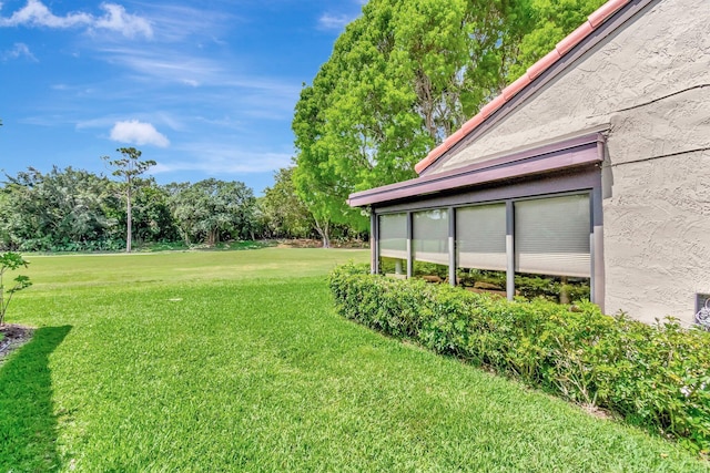 8030 Eastlake Dr Unit 10B, Boca Raton, FL 33433 - view of green lawn with view of scattered trees