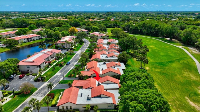 8030 Eastlake Dr Unit 10B, Boca Raton, FL 33433 - aerial perspective of suburban area featuring a large body of water, a tree filled landscape, and a local golf course