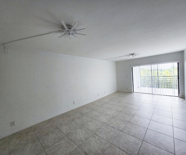9235 SW 8th St Unit 402, Boca Raton, FL 33428 - unfurnished room with a ceiling fan and tile patterned flooring