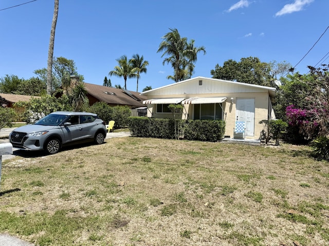 3520 Suncrest Rd, Lake Worth, FL 33467 - view of front of property with a front yard
