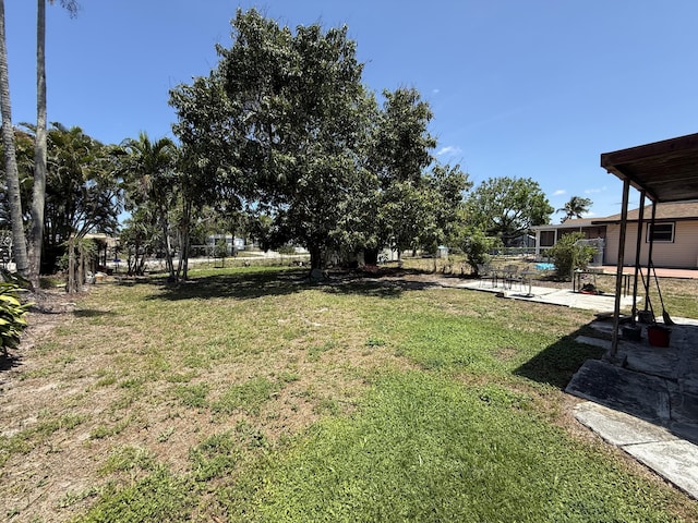3520 Suncrest Rd, Lake Worth, FL 33467 - view of grassy yard with a patio area