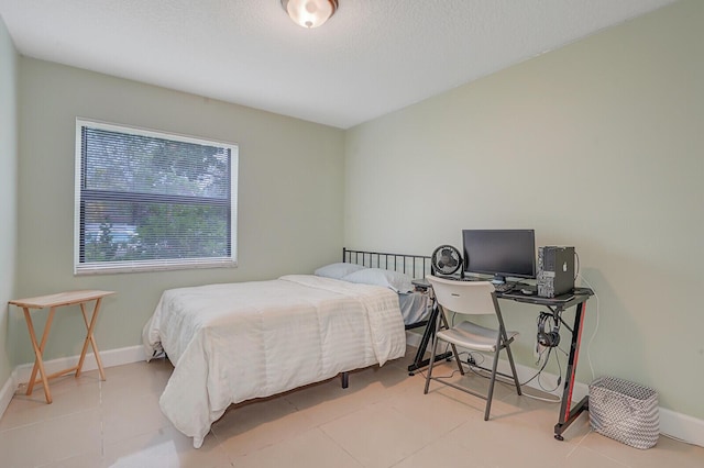 11500 NW 42nd St Unit 1-4, Coral Springs, FL 33065 - bedroom featuring baseboards