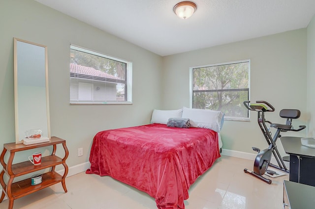 11500 NW 42nd St Unit 1-4, Coral Springs, FL 33065 - bedroom with baseboards