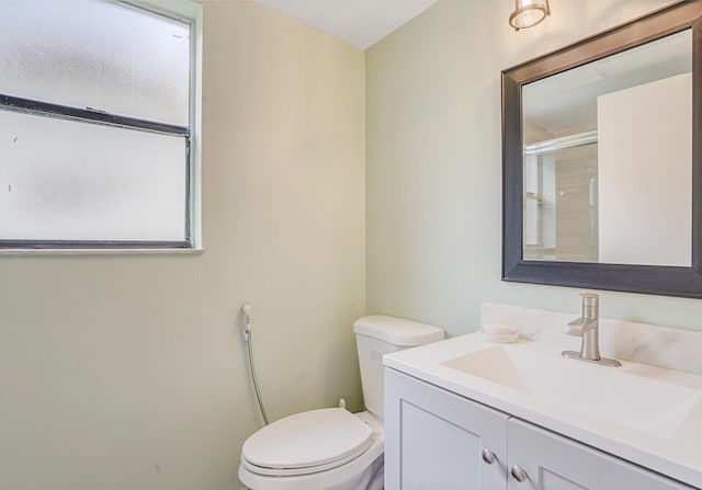 11500 NW 42nd St Unit 1-4, Coral Springs, FL 33065 - full bathroom with toilet, vanity, and a shower with shower door