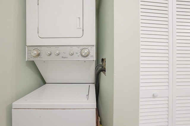 11500 NW 42nd St Unit 1-4, Coral Springs, FL 33065 - clothes washing area featuring stacked washer / drying machine