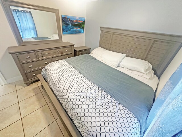 3946 A St, Palm Springs, FL 33461 - bedroom with light tile patterned floors