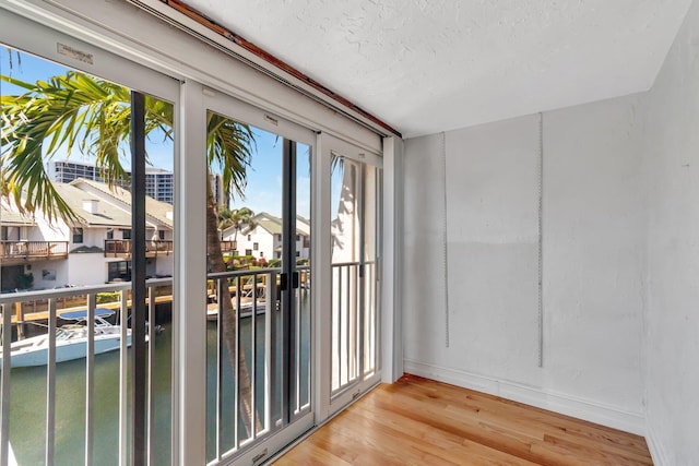 1100 Russell Dr, Highland Beach, FL 33487 - interior space with wood finished floors and baseboards