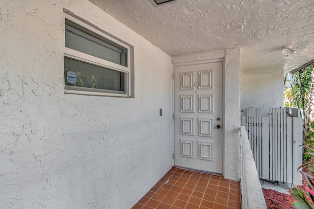 1100 Russell Dr, Highland Beach, FL 33487 - view of exterior entry featuring stucco siding