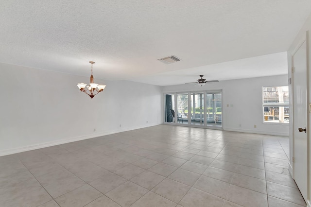 1100 Russell Dr, Highland Beach, FL 33487 - empty room featuring a chandelier, a textured ceiling, light tile patterned flooring, baseboards, and ceiling fan