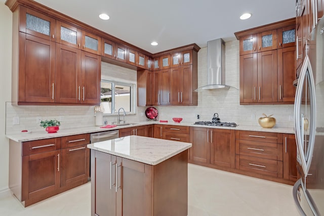 391 Glenbrook Dr, Atlantis, FL 33462 - kitchen with wall chimney exhaust hood, a sink, appliances with stainless steel finishes, decorative backsplash, and light stone counters