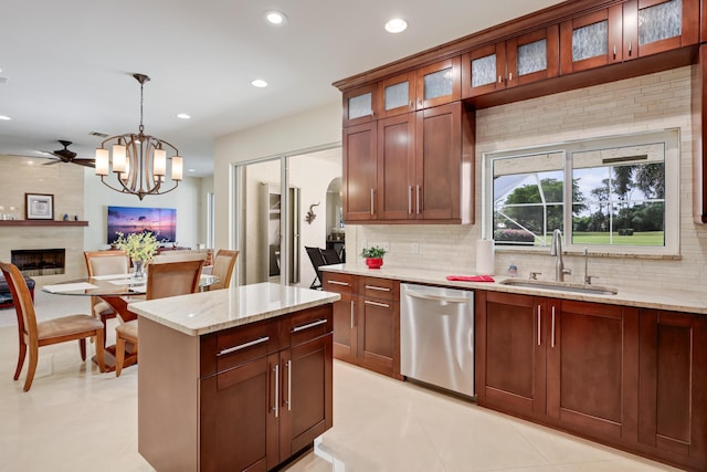 391 Glenbrook Dr, Atlantis, FL 33462 - kitchen with dishwasher, a sink, tasteful backsplash, decorative light fixtures, and recessed lighting