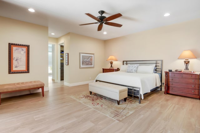 391 Glenbrook Dr, Atlantis, FL 33462 - bedroom with light wood-type flooring, recessed lighting, baseboards, and ceiling fan