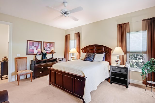 391 Glenbrook Dr, Atlantis, FL 33462 - bedroom featuring light colored carpet, a ceiling fan, and baseboards