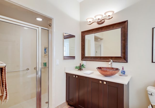 391 Glenbrook Dr, Atlantis, FL 33462 - bathroom with a shower stall, vanity, and toilet
