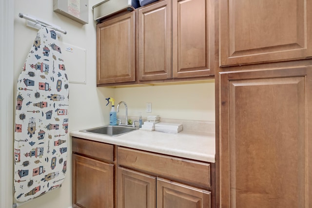 391 Glenbrook Dr, Atlantis, FL 33462 - kitchen featuring a sink and light countertops