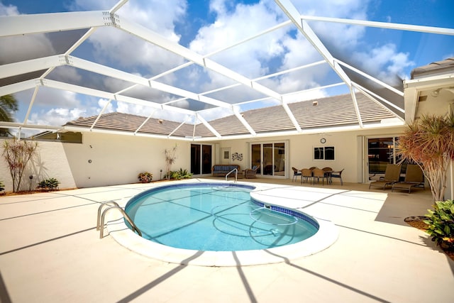 391 Glenbrook Dr, Atlantis, FL 33462 - swimming pool featuring a patio area and a lanai