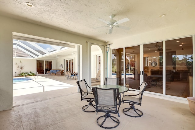 391 Glenbrook Dr, Atlantis, FL 33462 - view of patio with ceiling fan, outdoor dining space, and an outdoor pool