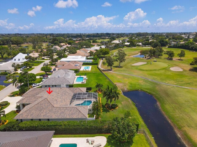 391 Glenbrook Dr, Atlantis, FL 33462 - aerial view of residential area with a nearby body of water, a pool area, and a golf course