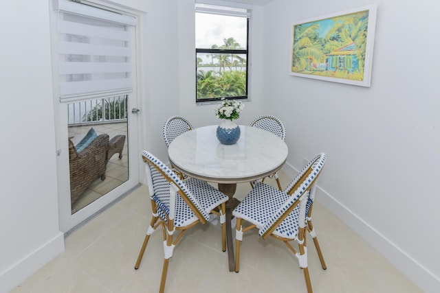 2860 S Ocean Blvd Unit 202, Palm Beach, FL 33480 - dining room with baseboards and tile patterned flooring