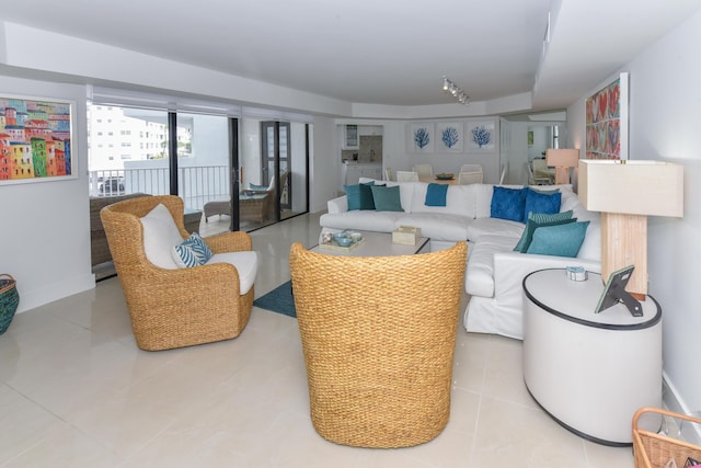 2860 S Ocean Blvd Unit 202, Palm Beach, FL 33480 - tiled living area with baseboards