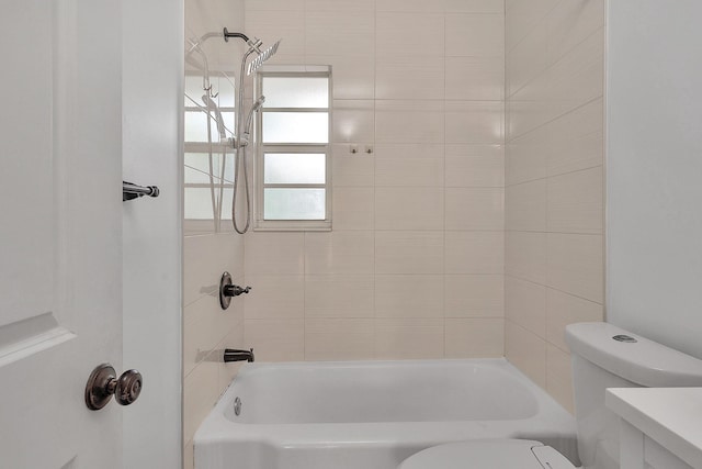 full bath featuring toilet and  shower combination