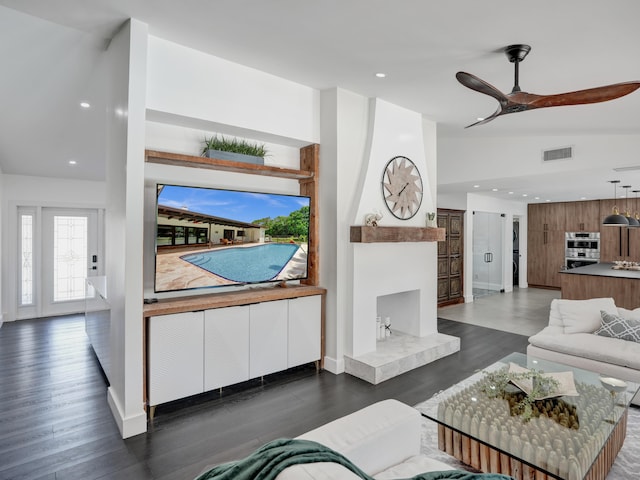 2708 NW 26th Cir, Boca Raton, FL 33431 - living area featuring dark wood finished floors, recessed lighting, baseboards, a ceiling fan, and lofted ceiling