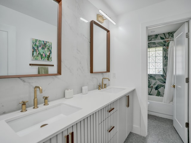 2708 NW 26th Cir, Boca Raton, FL 33431 - bathroom featuring double vanity, decorative backsplash, tub / shower combination, and tile patterned flooring
