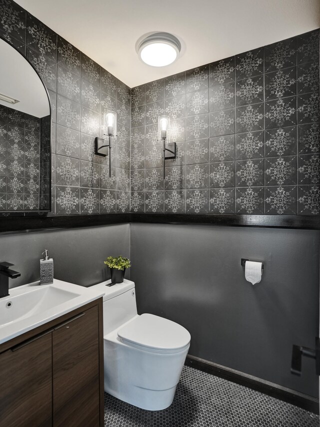 2708 NW 26th Cir, Boca Raton, FL 33431 - bathroom featuring toilet, tile patterned flooring, and vanity