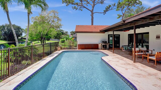 2708 NW 26th Cir, Boca Raton, FL 33431 - view of swimming pool with a fenced backyard and a patio area