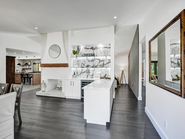 2708 NW 26th Cir, Boca Raton, FL 33431 - indoor bar featuring beverage cooler, dark wood finished floors, range hood, tasteful backsplash, and recessed lighting