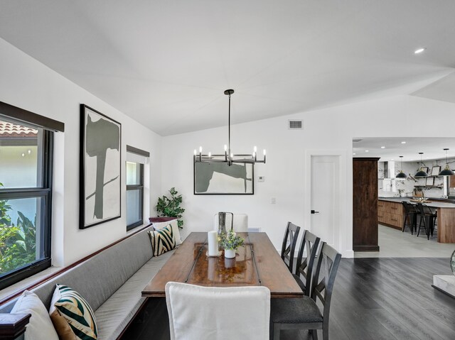 2708 NW 26th Cir, Boca Raton, FL 33431 - dining room featuring a chandelier, dark wood finished floors, and lofted ceiling