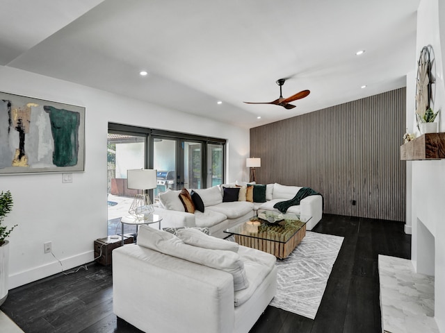 2708 NW 26th Cir, Boca Raton, FL 33431 - living room featuring an accent wall, recessed lighting, a ceiling fan, dark wood-style flooring, and baseboards