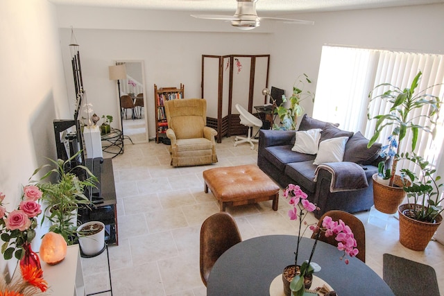 606 6th Way, West Palm Beach, FL 33407 - living area featuring a ceiling fan and light tile patterned floors