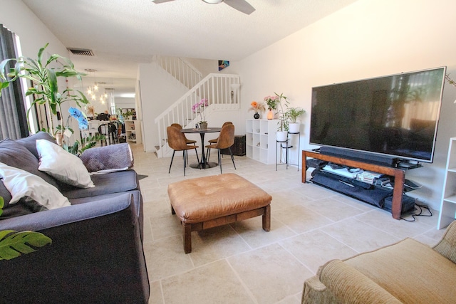 606 6th Way, West Palm Beach, FL 33407 - living room featuring stairway, light tile patterned floors, and a ceiling fan