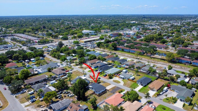 aerial view of property's location featuring nearby suburban area