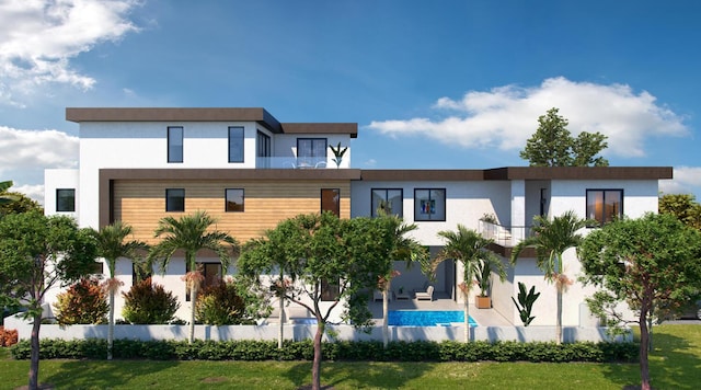 301 NE 7th Ave, Delray Beach, FL 33483 - rear view of house featuring stucco siding and a yard