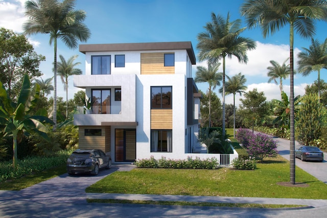 301 NE 7th Ave, Delray Beach, FL 33483 - contemporary house with stucco siding, a balcony, driveway, and a front lawn