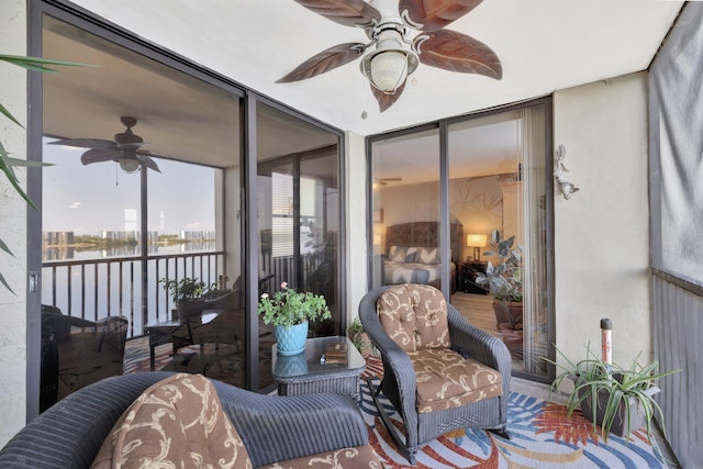 113 Lake Emerald Dr Unit 409, Oakland Park, FL 33309 - sunroom with a ceiling fan and a water view