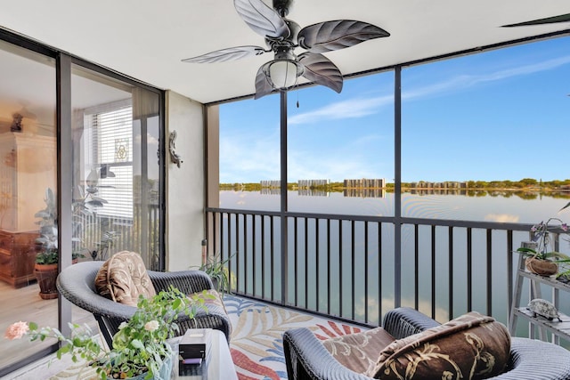 113 Lake Emerald Dr Unit 409, Oakland Park, FL 33309 - sunroom / solarium with a water view and a ceiling fan