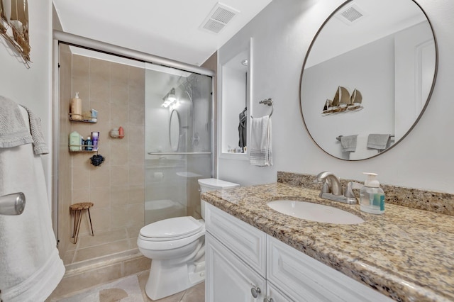 113 Lake Emerald Dr Unit 409, Oakland Park, FL 33309 - bathroom featuring a stall shower, toilet, vanity, and tile patterned flooring