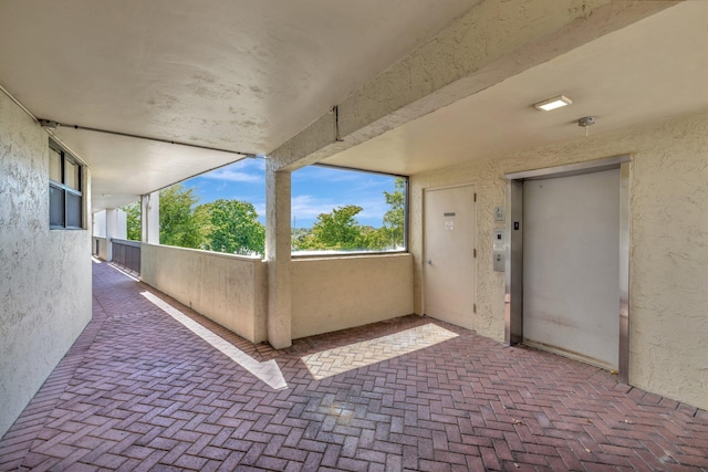 113 Lake Emerald Dr Unit 409, Oakland Park, FL 33309 - view of patio featuring elevator