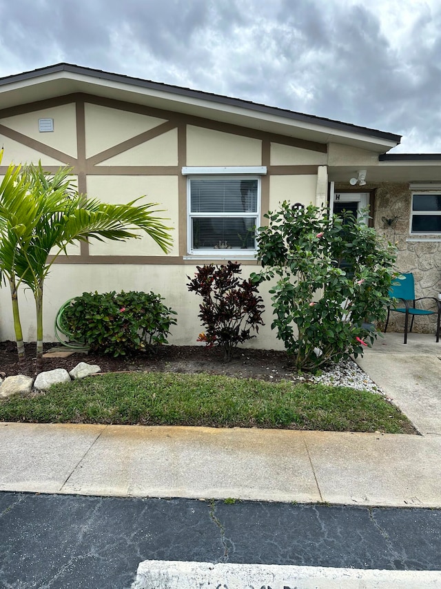 view of property exterior with stucco siding