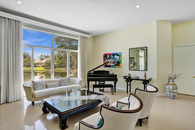 19262 Redberry Ct, Boca Raton, FL 33498 - living room featuring recessed lighting, light tile patterned floors, baseboards, a water view, and a textured ceiling
