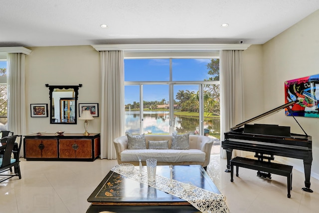 19262 Redberry Ct, Boca Raton, FL 33498 - living area with recessed lighting, a water view, and light tile patterned floors