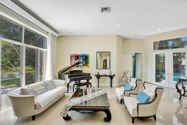 19262 Redberry Ct, Boca Raton, FL 33498 - living area with french doors, recessed lighting, and tile patterned floors