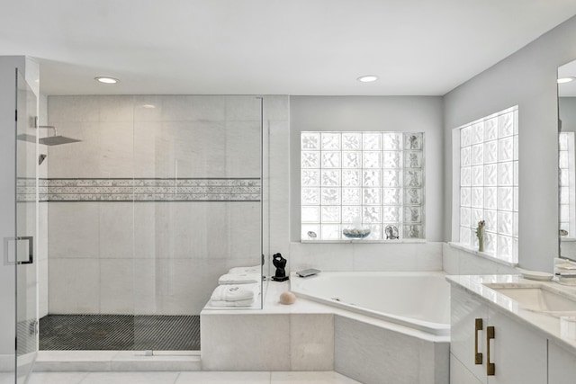 19262 Redberry Ct, Boca Raton, FL 33498 - bathroom with a shower stall, plenty of natural light, a bath, vanity, and recessed lighting