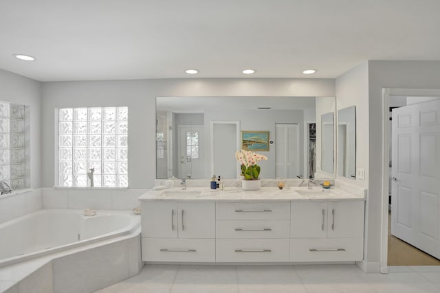 19262 Redberry Ct, Boca Raton, FL 33498 - bathroom with a bath, double vanity, tile patterned floors, recessed lighting, and a shower